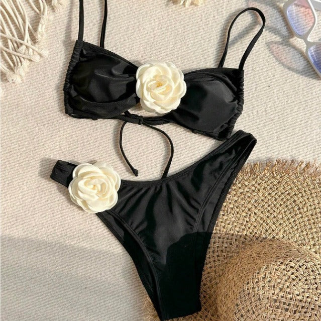 Flora Black Rose Two Piece Bikini with 3D ivory floral accents from 7th of April boutique on a textured surface | 7th of April