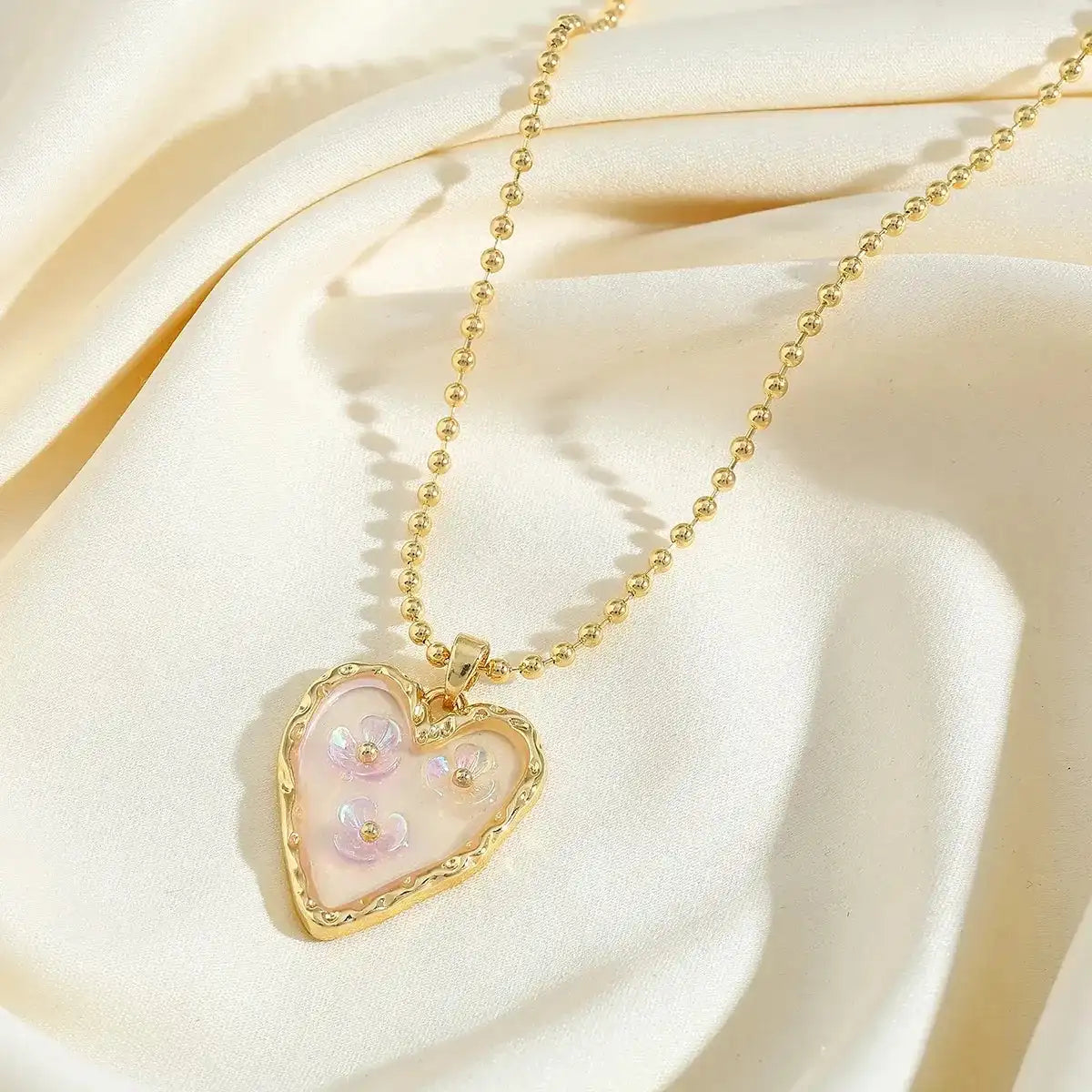 Waterproof Corazon Florencio Gold Heart Necklace with Pink Floral Inlay in 18K gold