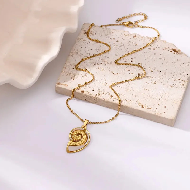 Waterproof Gold Caracol Shell Pendant Necklace in 18K gold plated stainless steel | 7th of April