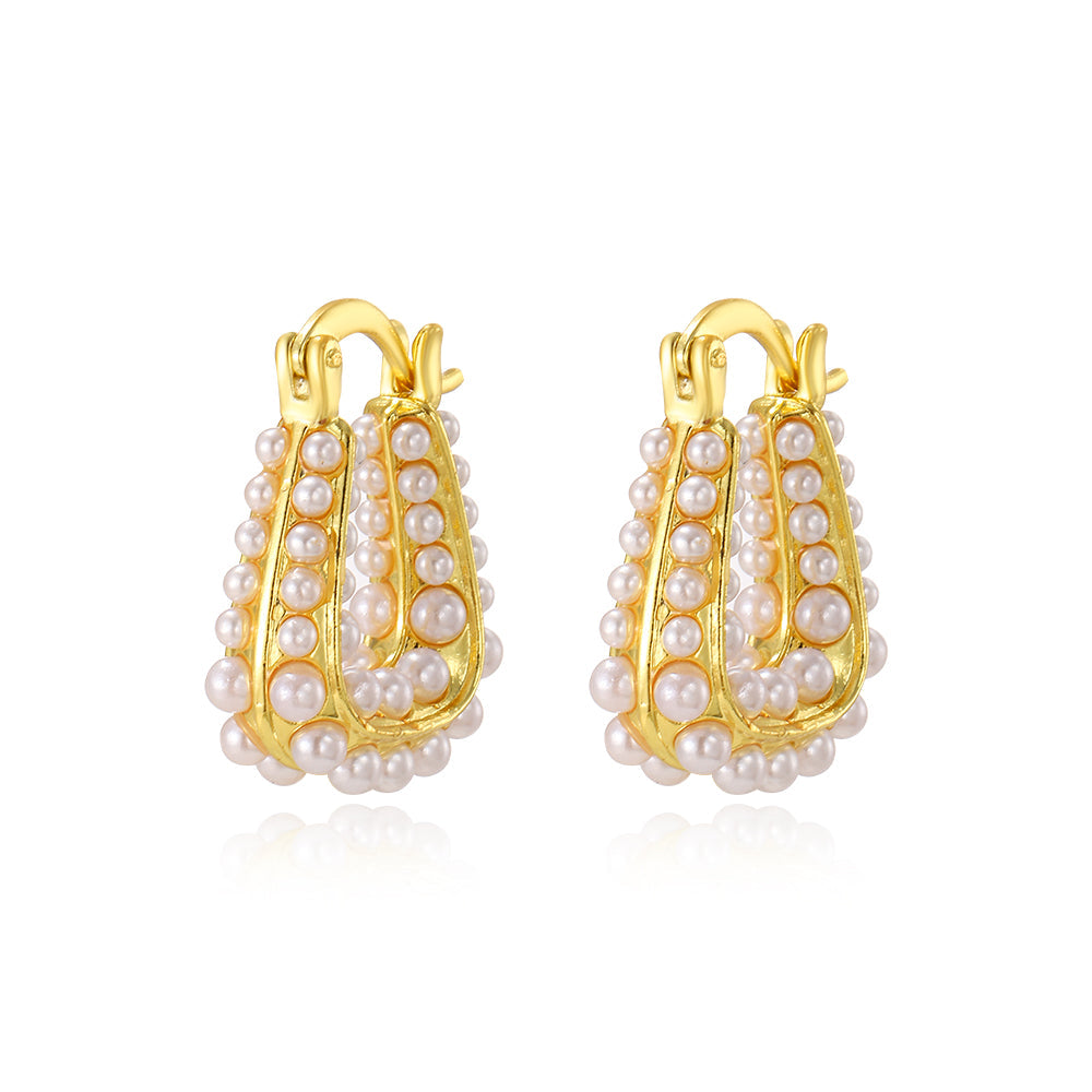 Waterproof Gold North Sea Hoop Earrings in 18K gold plated stainless steel on a white background