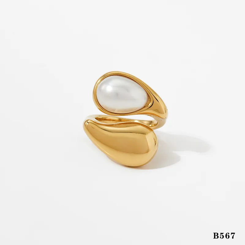 Waterproof Gold Pearl Statement Band Ring in 18K gold plated stainless steel on a white background