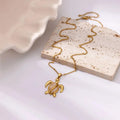 Waterproof Gold Sea Turtle Pendant Necklace in 18K gold plated stainless steel | 7th of April