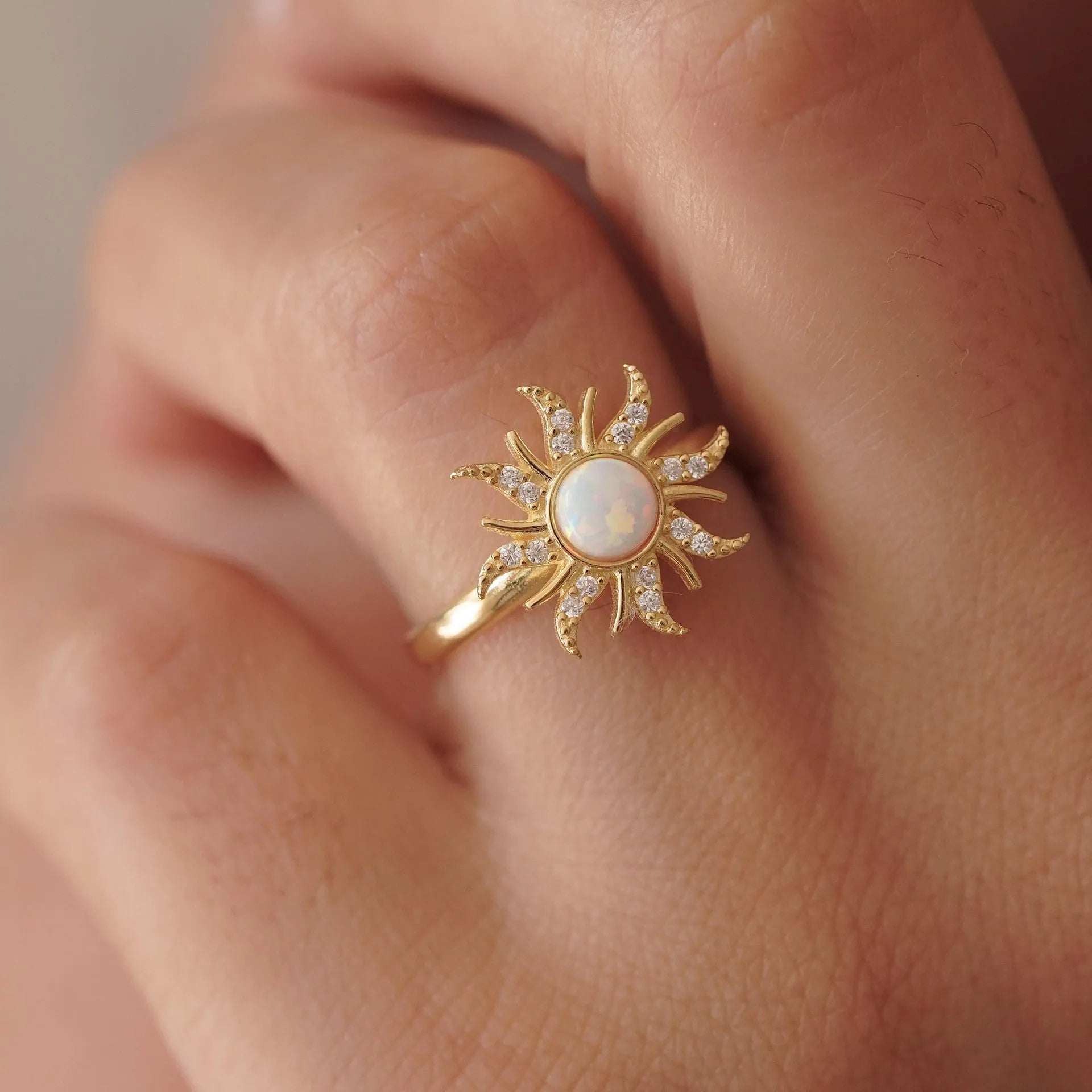 Waterproof Gold Sun Medallion Adjustable Ring in 18K gold plated stainless steel on a finger