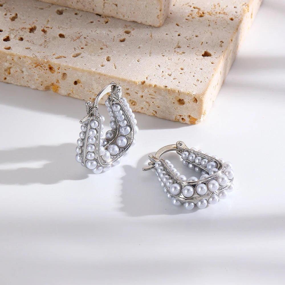 Waterproof Silver South Sea Hoop Earrings in premium stainless steel  on a textured surface | 7th of April