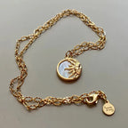 Waterproof Sol Gold Sun Charm Necklace in 18K gold plated stainless steel | 7th of April