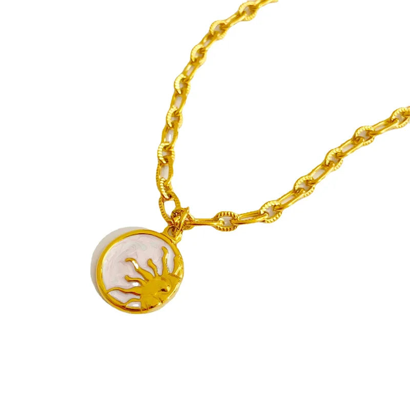 Waterproof Sol Gold Sun Charm Necklace in 18K gold plated stainless steel | 7th of April